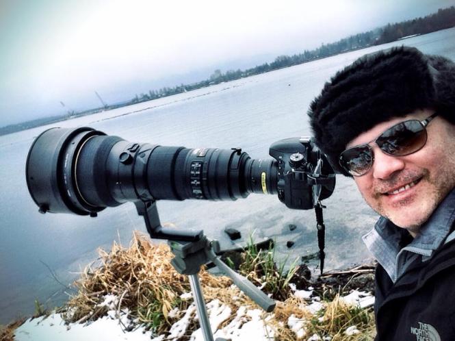 This is me at Union Bay Natural Area with the Nikkor 400mm F2.8 VR and 2x extender. These lenses are so expensive that it's WAY cheaper to rent them than buy them. But if I won the lottery I just might have to get one...